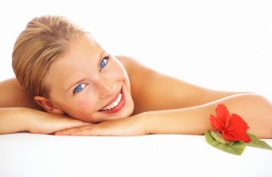 A beautiful young woman relaxing on a massage table before her massage
